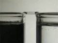 Мостик между двумя стаканами воды, образуемый электрическим разрядом